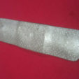 Bandage, 2011<br> Painted cast white metal<br> 3 x 3/4 x 1/16 inches<br><br>  Allora & Calzadilla For Artists Space