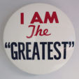 I am the Greatest button, 2012<br> fiberglass, steel, MDF, auto paint<br> 35"x8"<br><br>Hank Willis Thomas